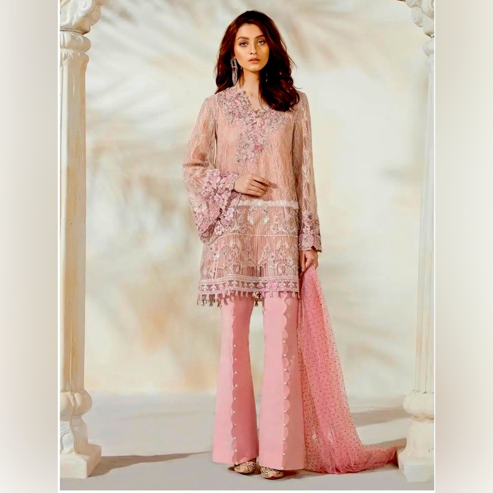 Soft pink net swing shirt, cotton silk slip and boot cut trousers net dupatta
